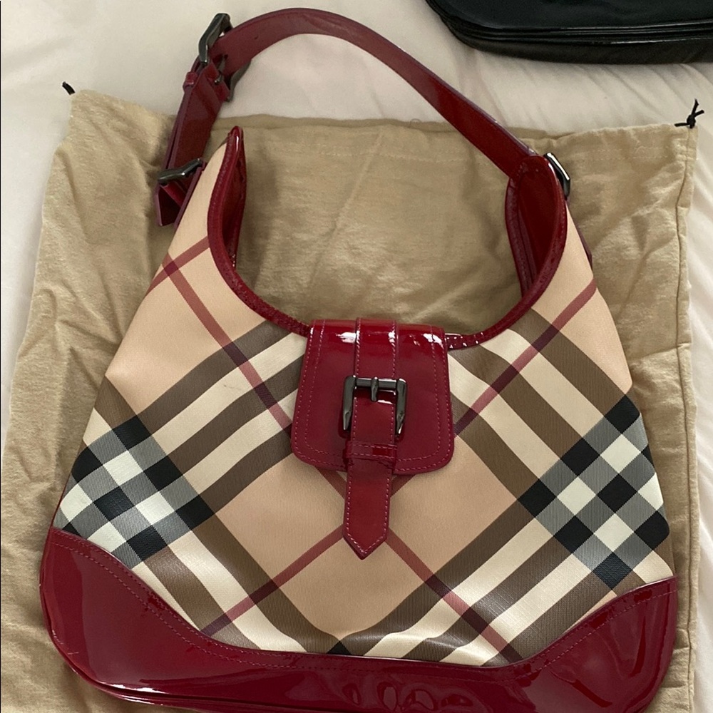 Burberry Red and Beige Checkered Women's Bag. The color is Raspberry.